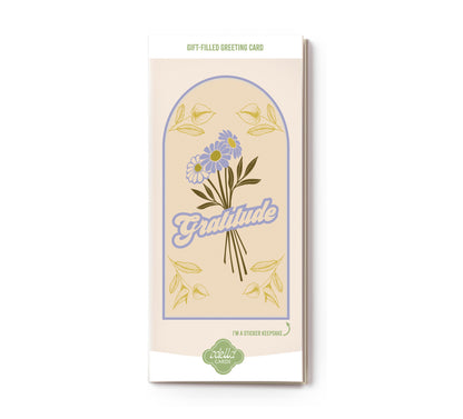 Greeting card with floral design and 'gratitude' text on a white background