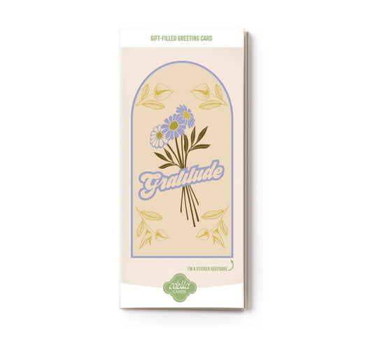 Greeting card with floral design and 'gratitude' text on a white background