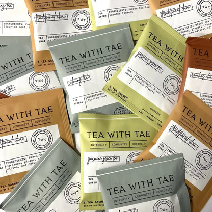 Tea packages with 'Tea with Tae' branding on a white background