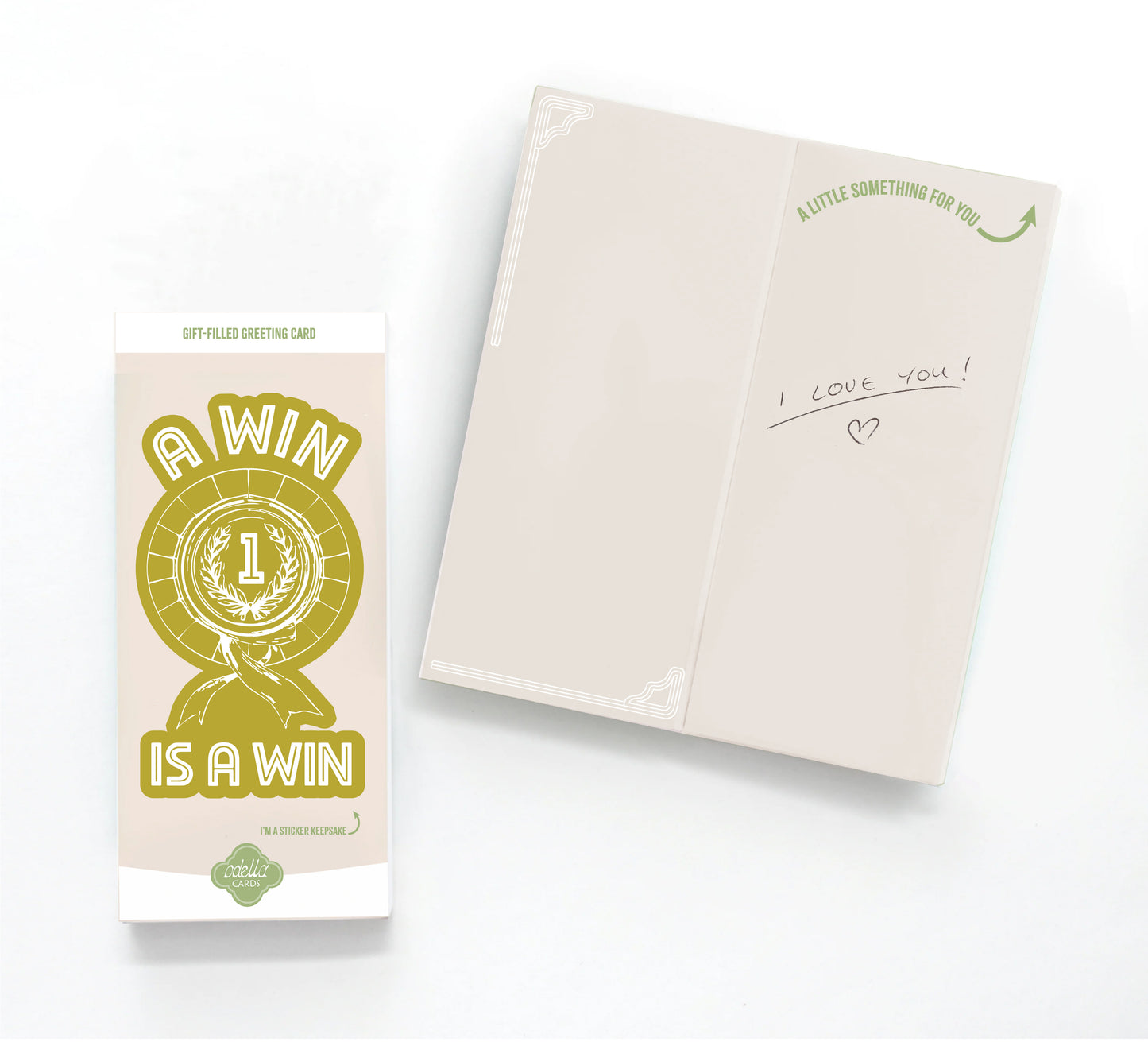Greeting card with 'A win is a win' design and an open card showing 'I love you!' text.